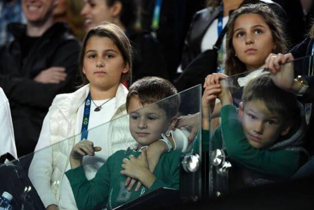 Leo Federer with his twin sisters and brother.